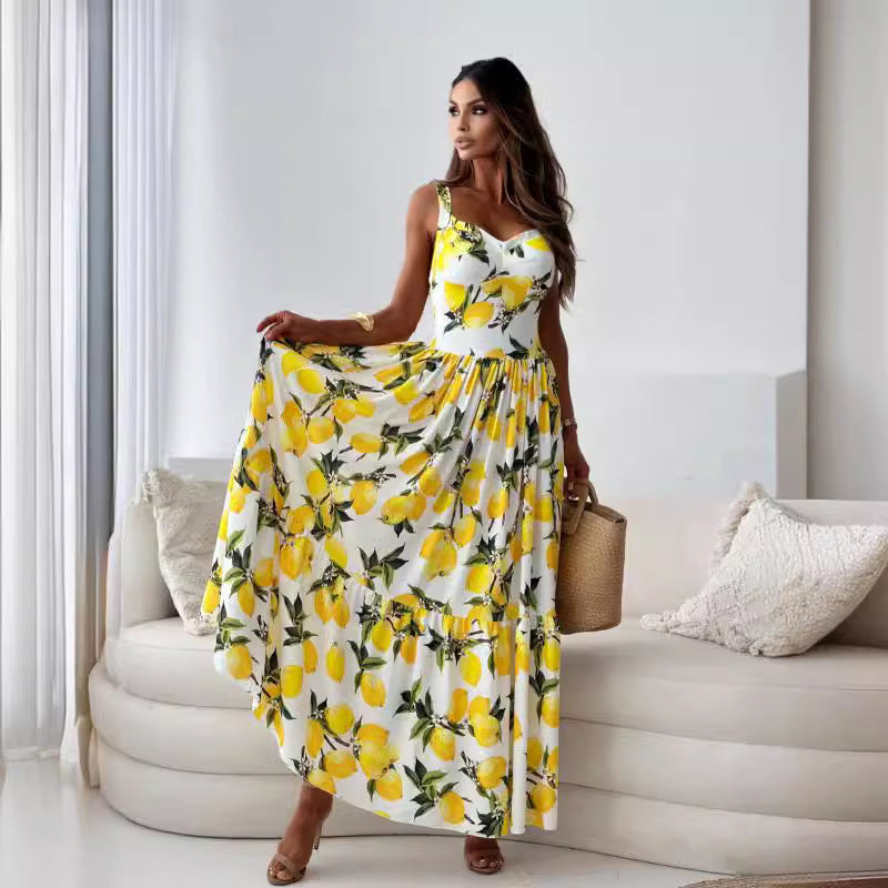 Vestido largo fluido con tirantes finos y estampado elegante de limones para mujer