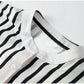Blusa informal de rayas con cuello redondo y botones en la parte delantera